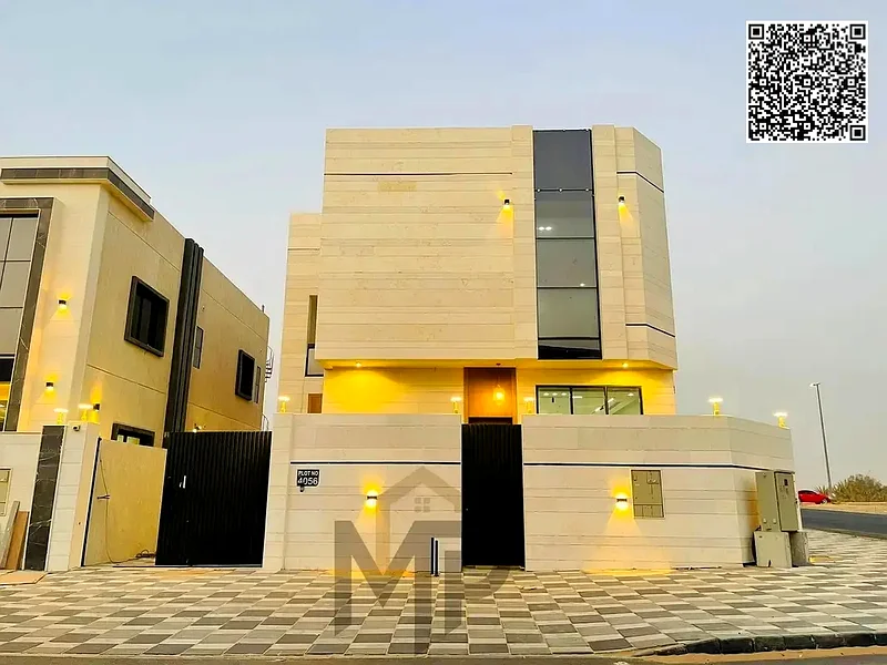 For sale, a corner villa in Al Helio 2 - Ajman, directly from the owner, in a prime location and excellent space. Registration fees included.63899337136002111