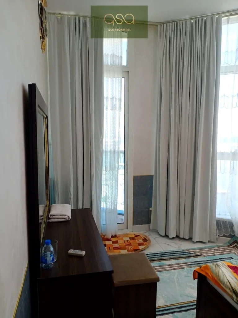 STUNNING FULLY FURNISHED THREE BEDROOM WITH PARKING, CLOSED KITCHEN, AND OPEN VIEW BALCONY IS NOW AVAILABLE FOR SALE IN OASIS TOWER 2, AJMAN!63890250486785113