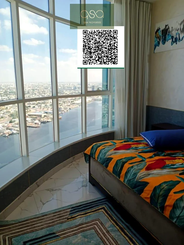 STUNNING FULLY FURNISHED THREE BEDROOM WITH PARKING, CLOSED KITCHEN, AND OPEN VIEW BALCONY IS NOW AVAILABLE FOR SALE IN OASIS TOWER 2, AJMAN!63890250486785111