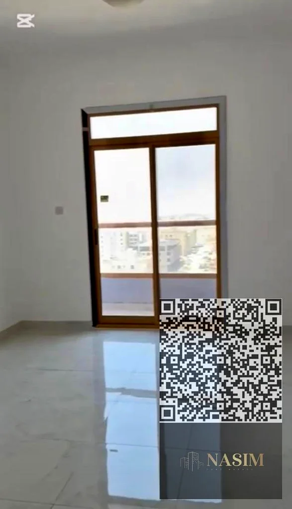 For sale, a one-bedroom apartment in Al Gharoub Tower, Ajman63873580397441112