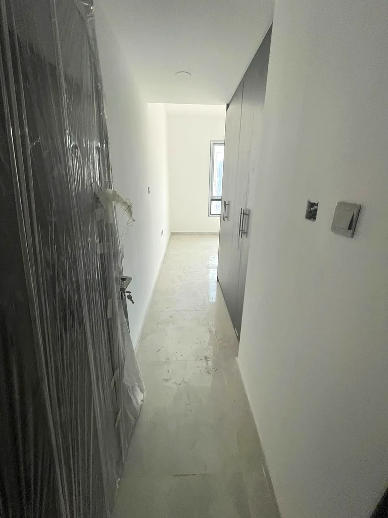 Two rooms and a hall with 3 bathrooms and built-in wardrobes, first tenant, spaces and finishes at the highest level, with a very excellent location63712780380417112