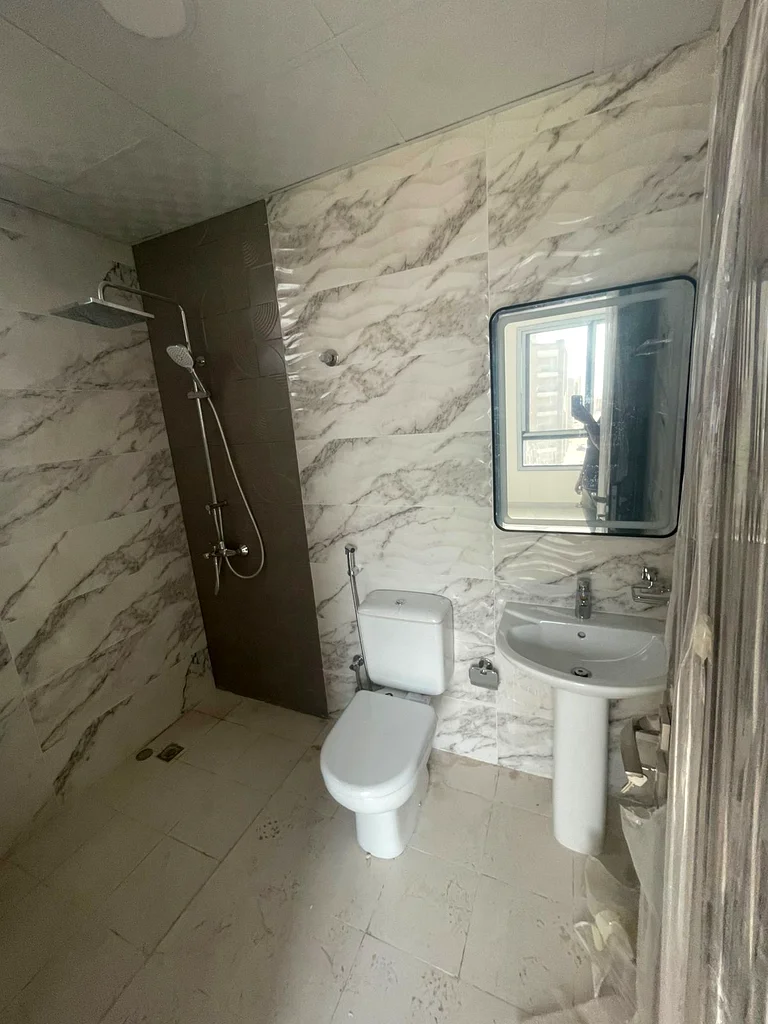 Two rooms and a hall with 3 bathrooms and built-in wardrobes, first tenant, spaces and finishes at the highest level, with a very excellent location63712780380417114
