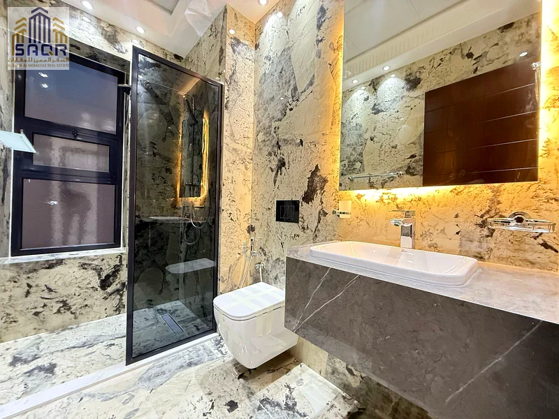 Palace-style villa in the most upscale areas of Ajman, central air conditioning, modern designs from the finest materials63913782034691114