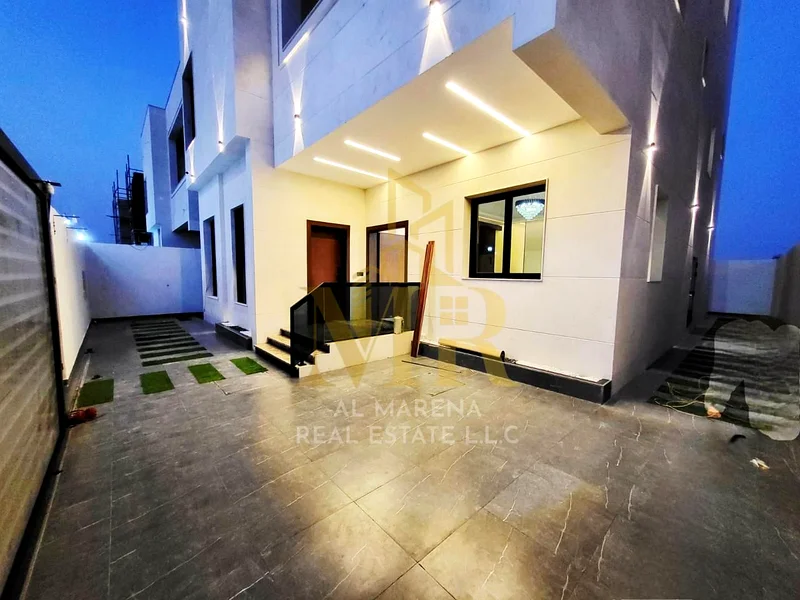 🏡 For Sale – Elegant Villa in Al Bahia, Ajman | 6 Master Bedrooms | Majlis | 2 Living Rooms | Main + Prep Kitchen | Rooftop | Full Stone Exterior | F63881373455362111
