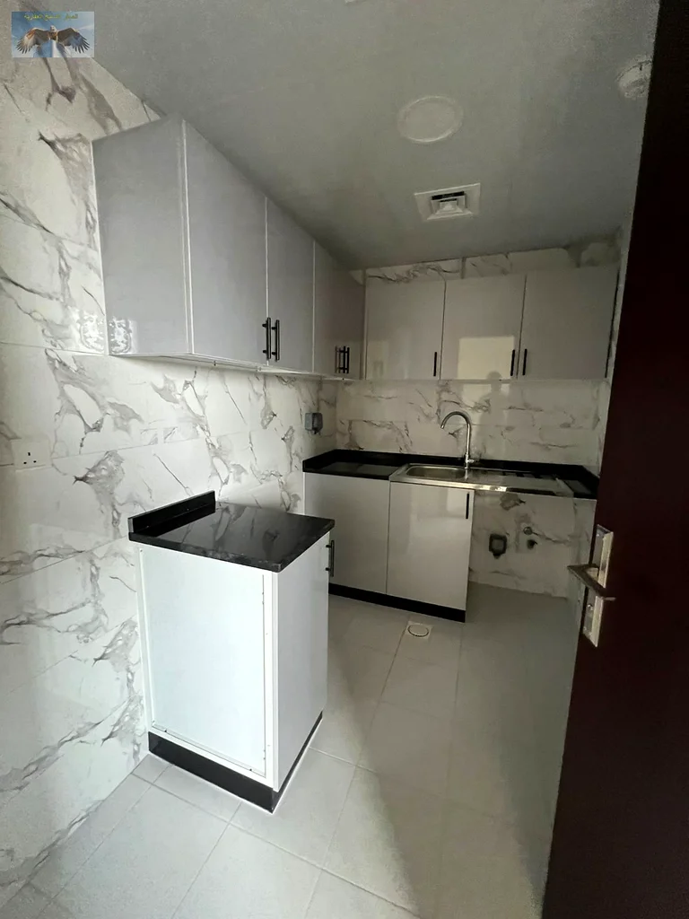 New apartment for annual rent in Al-Jarf, one room and a hall, first inhabitant, with modern finishing, quiet residential location close to all servic63713232350337112