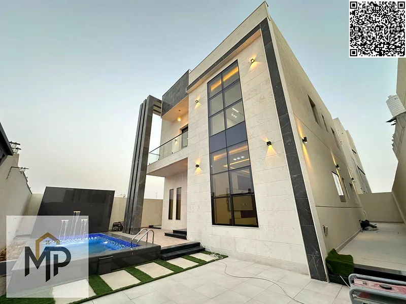 For sale - a luxury villa with a swimming pool in a prime location in Ajman, high-end finishing, modern design, including registration and owners63914523892993111