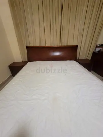 Elegant Wooden Bed with Matching Side Tables