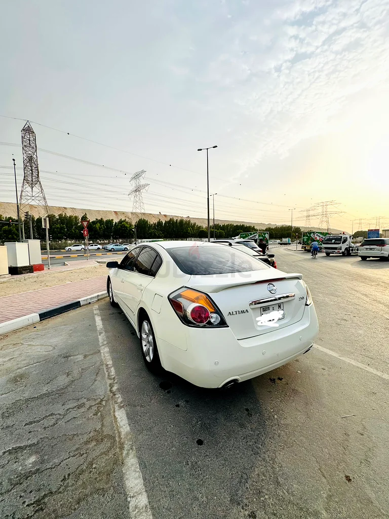 Nissan altima 200963488014689281111
