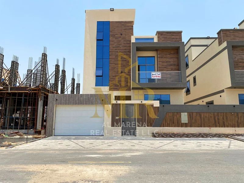 🏡 للبيع – فيلا فاخرة في الباهية – عجمان | طابقين + سطح | 6 غرف نوم رئيسية | مجلس + 3 غرف معيشة | مطبخين حديثين | غرفة خادمة | سبا63881373555329110