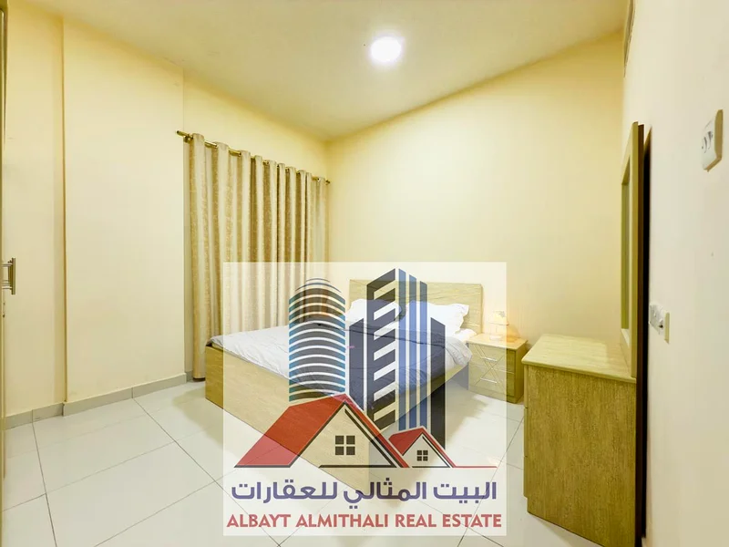 شقة واسعة مكونة من غرفتي نوم للإيجار في عجمان - الروضة 163722447450754111