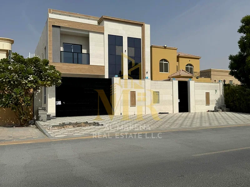 🏡 للبيع – فيلا فاخرة في المويهات 1 – عجمان | طابقين | 5 غرف نوم رئيسية | مجلس وغرفتا معيشة | مطبخ حديث ومطبخ إضافي في63868520097281110