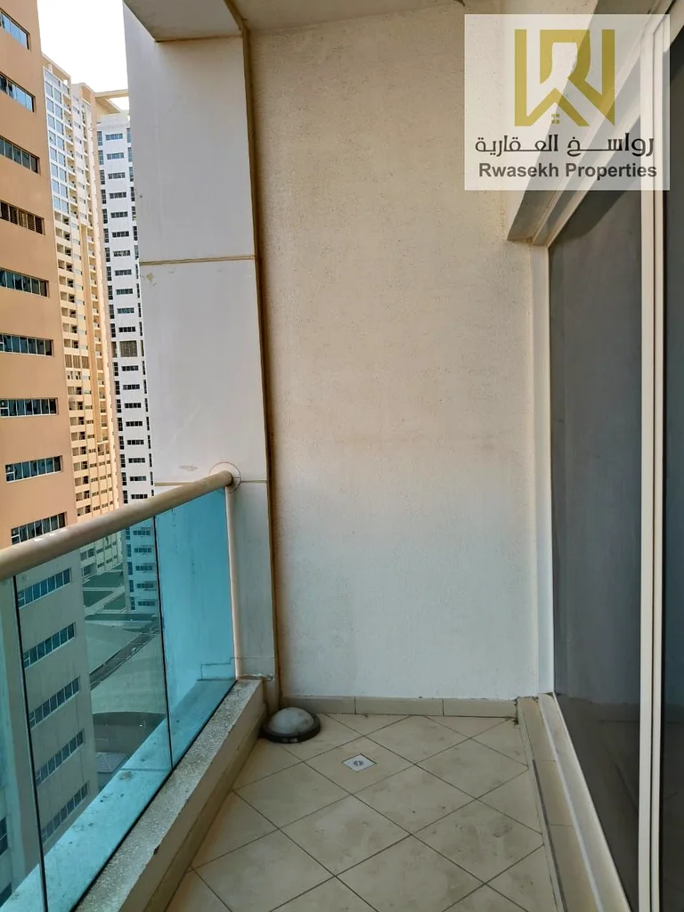 🏡 عيشة حضرية أنيقة مع هدوء الحديقة وسحر المطبخ المفتوح للبيع: شقة أنيقة بغرفة نوم واحدة في أبراج عجمان وان – 975.1 قدم مربع اخطو إلى63890376328963112
