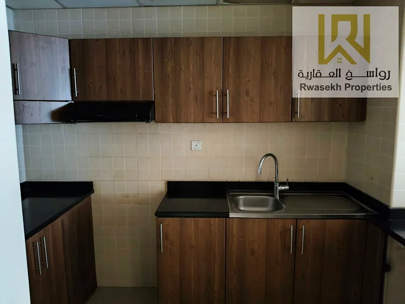 🏡 عيشة حضرية أنيقة مع هدوء الحديقة وسحر المطبخ المفتوح للبيع: شقة أنيقة بغرفة نوم واحدة في أبراج عجمان وان – 975.1 قدم مربع اخطو إلى63890376328963114