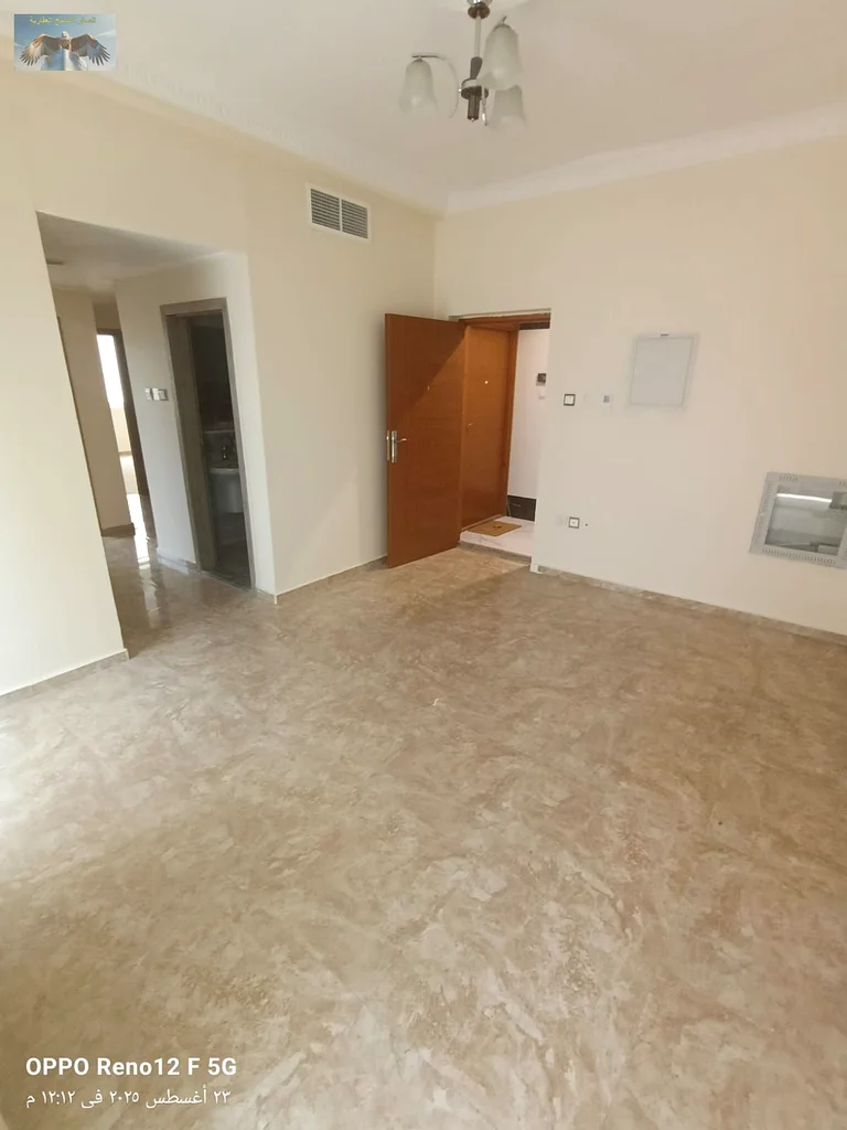 New apartment for the first tenant in Al Rashidiya 2, Ajman, two bedrooms and a hall with modern finishes, with two bathrooms, a large balcony, and bu63721701004547112