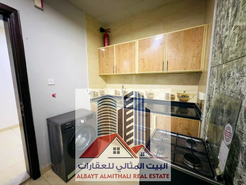 **🌟 للإيجار: شقة مكونة من غرفتين نوم وصالة في موقع متميز – المويلحة 2، عجمان 🌟**63712511834754114