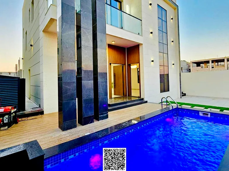 For sale - a luxury villa with a swimming pool in a prime location in Ajman, high-end finishing, modern design, including registration and owners63901036866562111