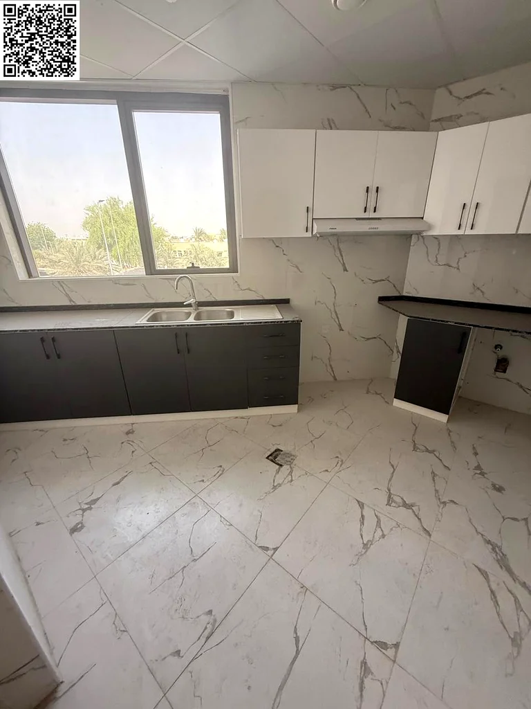 A free month with two bedrooms, a hall, two bathrooms, a balcony, super deluxe finishes, an equipped kitchen, and a vital location close to all servic63709403040131113