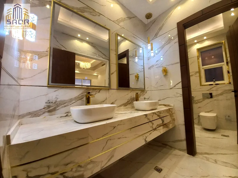 A distinctive villa for sale in Ajman, Al Helio area, with no registration fees and freehold for all nationalities. No annual service fees.63911619853571114