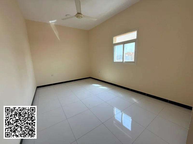 2BR + hall apartment for annual rent – 2 baths, balcony, central AC, elegant finish, easy access to Dubai & Sharjah.63811388713219113