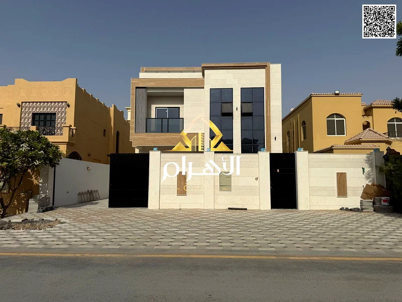 للبيع - فيلا في المويحة 1 - عجمان | طابقين | 5 غرف نوم رئيسية | مجلس وصالونين | مطبخ حديث + مطبخ إضافي | فناء كبير | O63868520154755110
