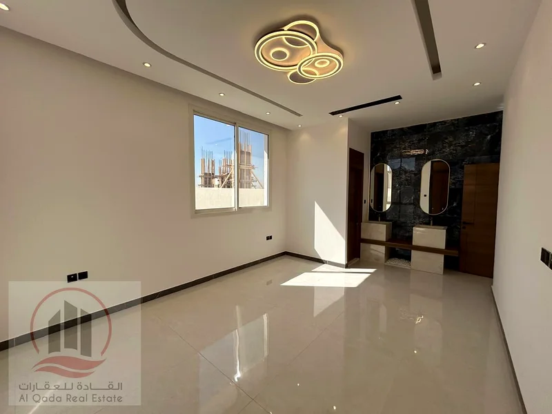 Villa For sale in Ajman Al Bahia, 4 master bedrooms, a living room, a hall, and a maid’s room, freehold for all nationalities, with the possibility of63881594271105114