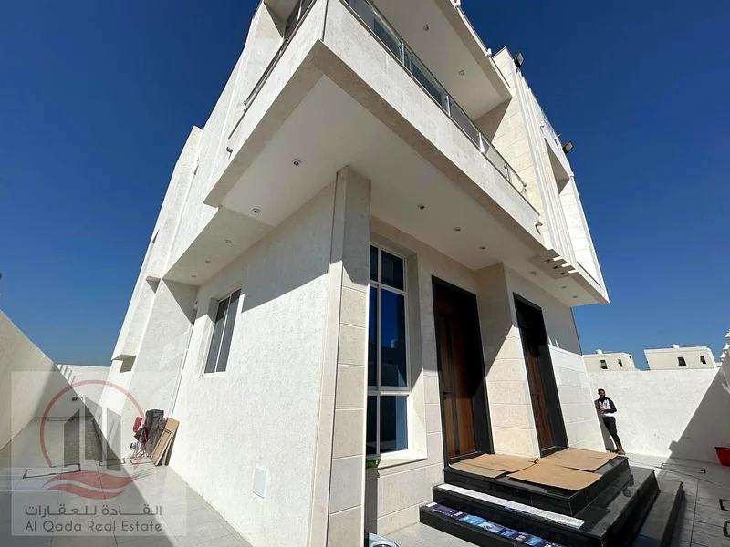 Villa For sale in Ajman Al Bahia, 4 master bedrooms, a living room, a hall, and a maid’s room, freehold for all nationalities, with the possibility of63881594271105111