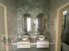 Villa for sale, including electricity and water, at a special price in Al Zahia area, 5 master bedro