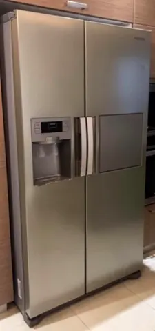 Modern Samsung Side-by-Side Refrigerator with Ice Dispenser in Excellent Performance