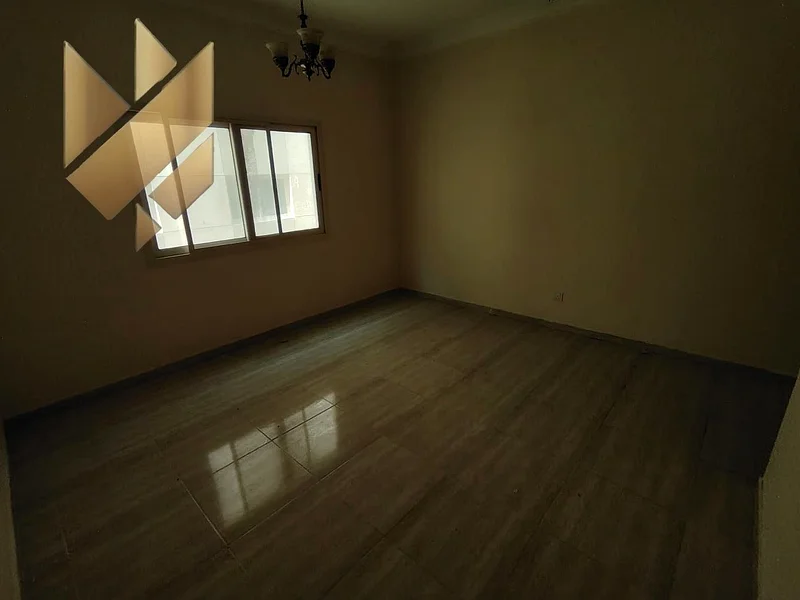 For annual rent, a room and a hall in New Muwailih, with wonderful finishes, excellent spaces and a wonderful view63812325438081111