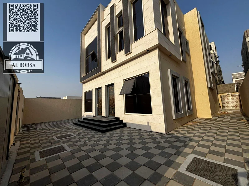 🏡 For sale, a luxurious villa in Al Helio, Ajman, 5 master bedrooms, a living room and a hall, located in a strategic location near Mohammed bin Zaye63911197524098113