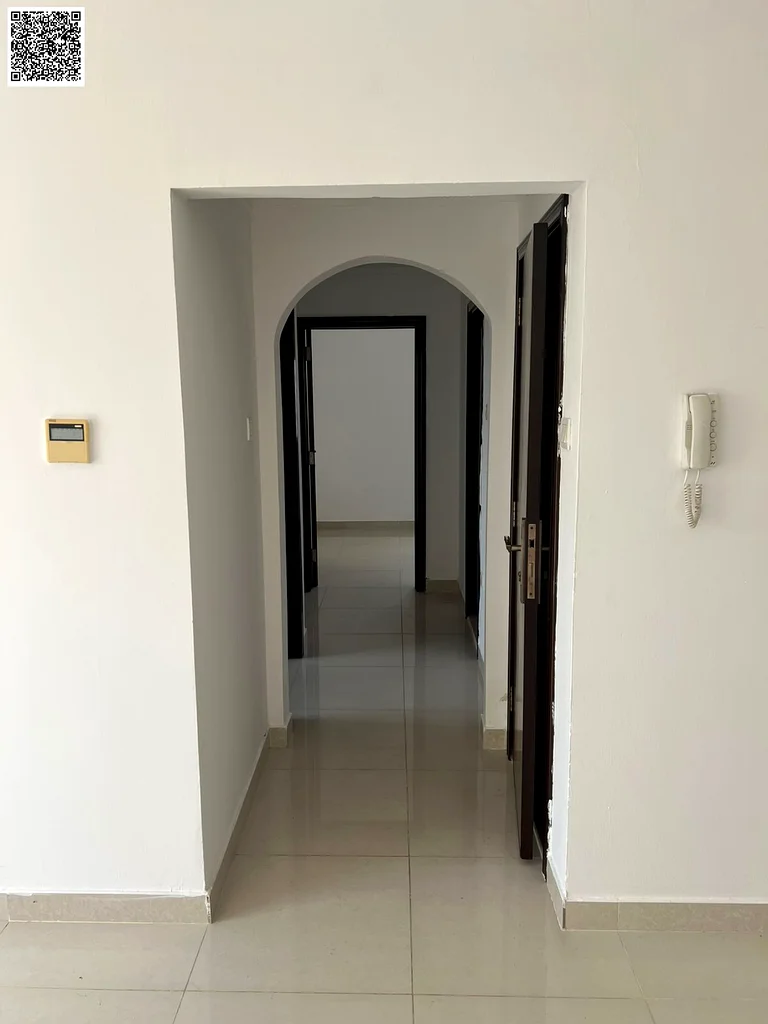 For annual rent – Spacious 2BHK in Al Rashidiya 2, Ajman with 2 large bedrooms, 2 baths, wide hall, balcony, fitted kitchen, prime location.63721053754242112