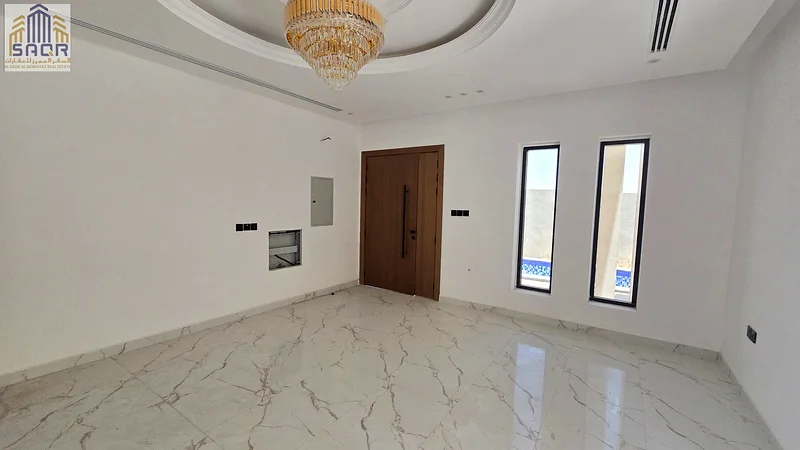 For sale - a luxurious villa with a swimming pool in a prime location in Ajman, high-end finishing, modern design, including registration and ownership63911619940610114