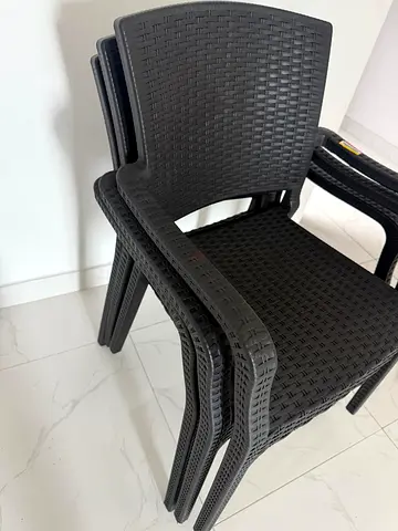 Set of 3 Stylish Black Woven Plastic Chairs - Perfect for Your Garden or Dining Area.