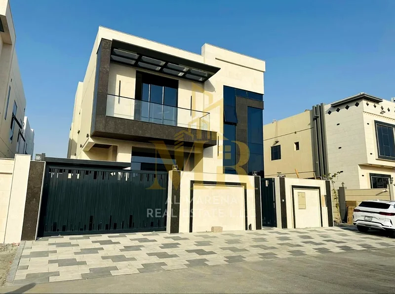 🏡 للبيع – فيلا فاخرة في الباهية – عجمان | طابقين | 5 غرف نوم رئيسية | مجلس + قاعتي معيشة | مطبخ عصري | مساحة الأرض 3,014 قدم مربع | السعر63882551665410112