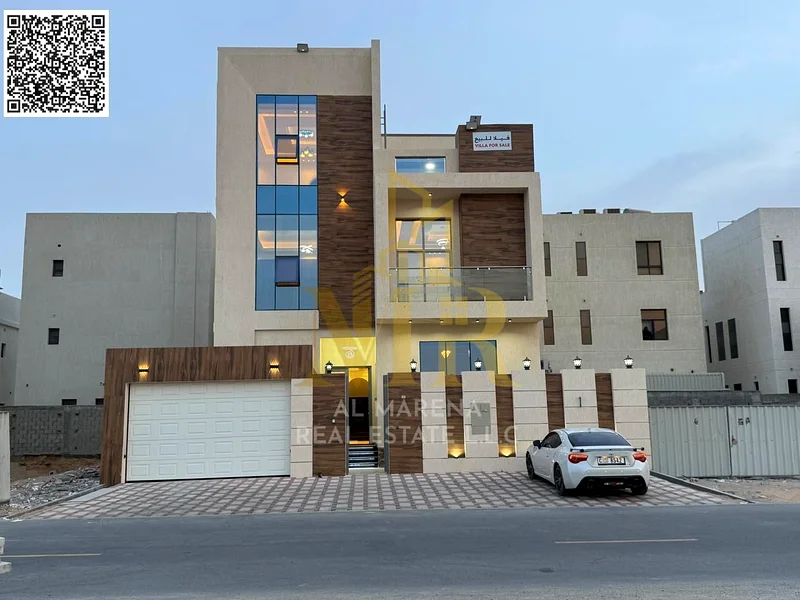 🏡 For Sale – Luxury Villa in Al Bahia – Ajman | 2 Floors + Roof | 6 Master Bedrooms | Majlis + 3 Living Halls | 3 Modern Kitchens | Maid’s Room | Roo63882551649794110