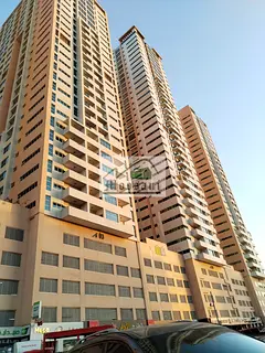Ajman One Towers: Spacious Sea View 2 Master Bedrooms Hall higher Floor with Parking For Rent
