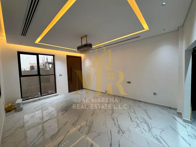🏡 For Sale – Luxury Villa in Al Bahia – Ajman | 2 Floors + Roof | 7 Master Bedrooms | Majlis + 2 Living Halls | Modern Kitchen | Maid’s Room | Large63882551608195112