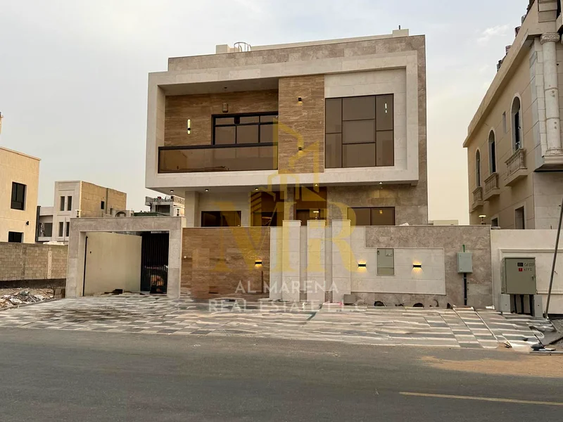 🏡 For Sale – Luxury Villa in Al Bahia – Ajman | 2 Floors + Roof | 7 Master Bedrooms | Majlis + 2 Living Halls | Modern Kitchen | Maid’s Room | Large63882551608195114
