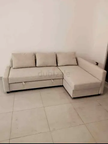 Ikea L Shape Sofa cum bed with big storage in L , and You can fix the L left and right any side