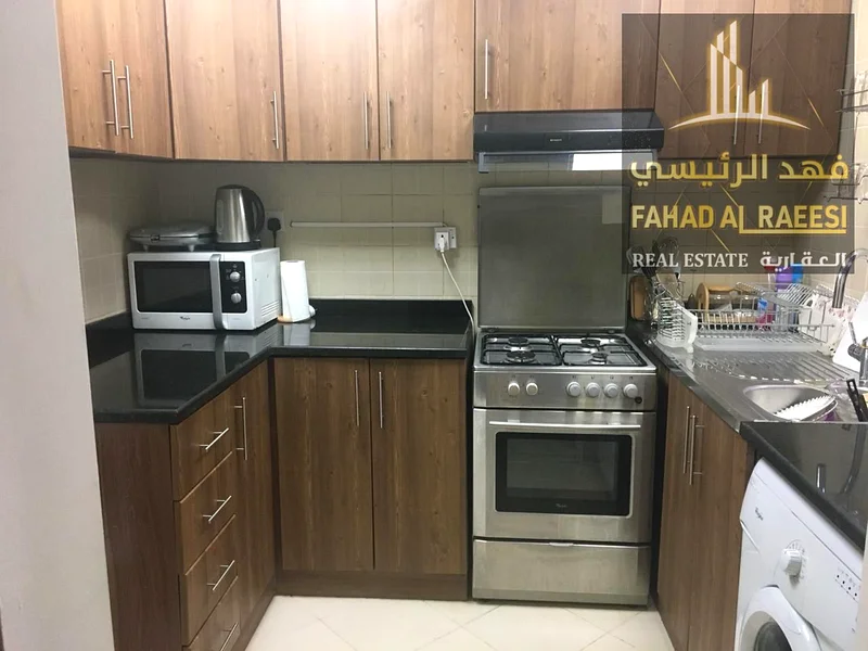 Luxury 2BHK apartment for sale in Ajman One at a stunning price with a swimming pool, gym, and private parking.63888277944451113
