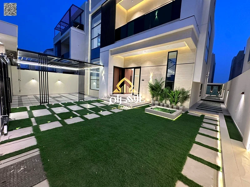 Villa for sale in Ajman, Al Bahia area. The villa consists of three floors, a swimming pool, 5 master bedrooms with closets, a sitting room, 3 halls,63881146957187112