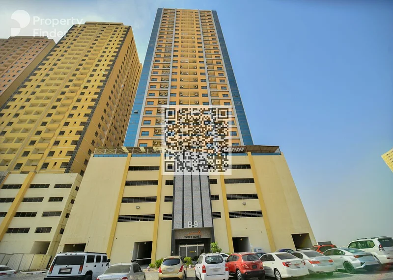 شقة واسعة مكونة من غرفتين نوم وصالة للإيجار في برج باراديس ليك (عجمان)63715947648386110