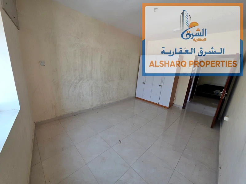 Two-bedroom apartment for annual rent in Ajman Corniche, second row, excellent new building, spacious areas, equipped kitchen, balcony with a wonderfu63810725758082113