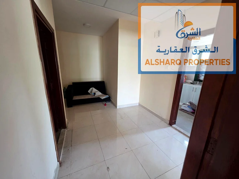 Two-bedroom apartment for annual rent in Ajman Corniche, second row, excellent new building, spacious areas, equipped kitchen, balcony with a wonderfu63810725758082114