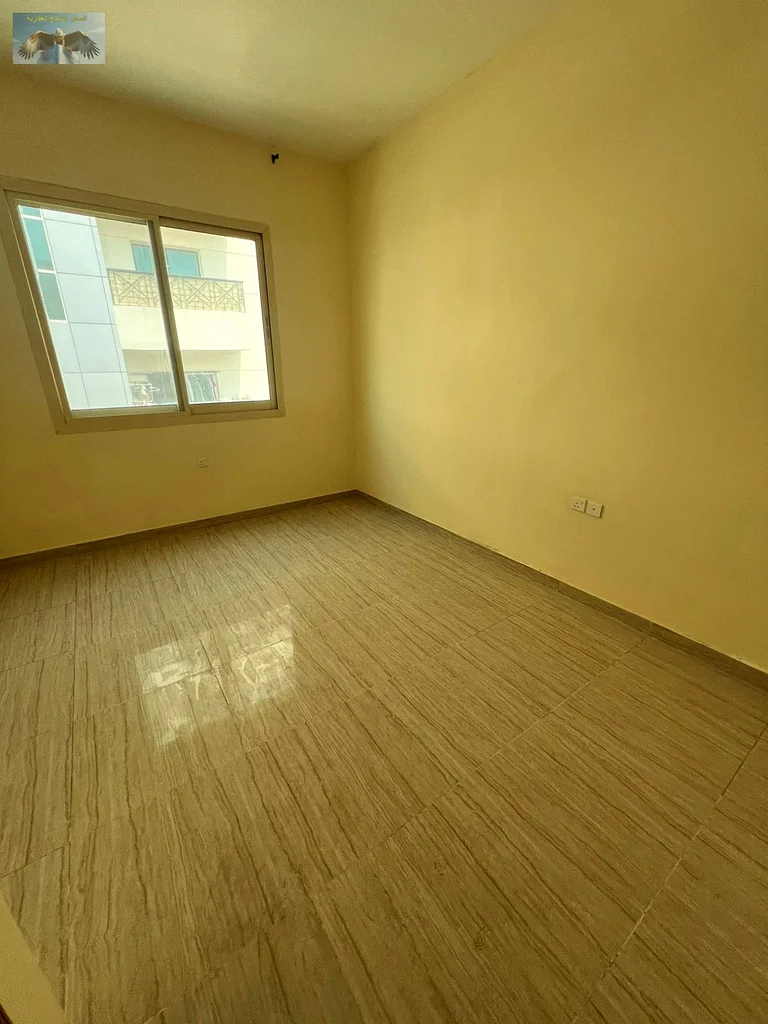 Two rooms and a hall for annual rent in Al Rashidiya 2 in Ajman, large balcony, spacious area, excellent finishing, vital area63721528537731112
