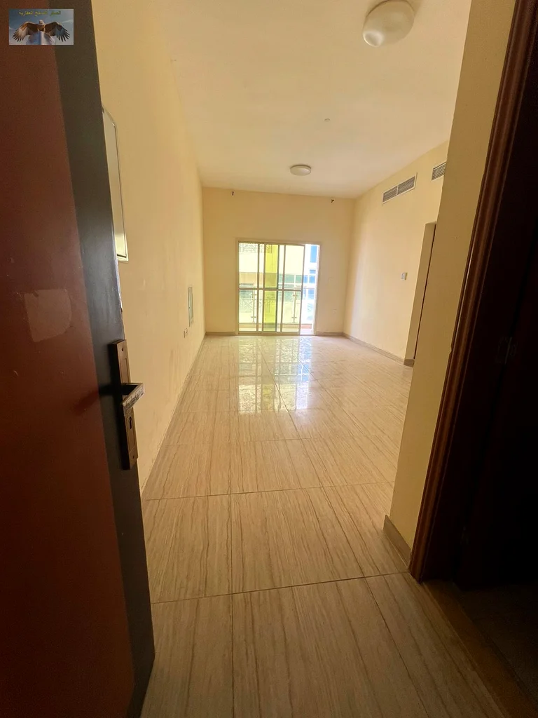 Two rooms and a hall for annual rent in Al Rashidiya 2 in Ajman, large balcony, spacious area, excellent finishing, vital area63721528537731114
