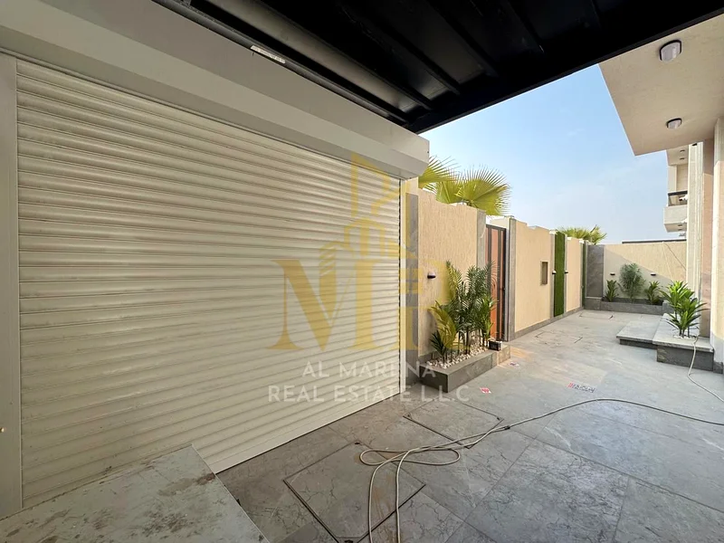 🏡 For Sale – Luxury Villa in Al Bahia – Ajman | 2 Floors + Roof | 6 Master Bedrooms | Majlis + Living Hall with Washbasins | Modern Kitchen | Private63882551625347114
