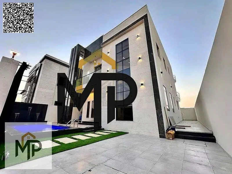 For sale - a luxury villa with a swimming pool in a prime location in Ajman, high-end finishing, modern design, including registration and swimming63902224352514110