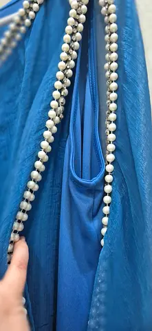 Elegant Blue Dress with Exquisite Detailing