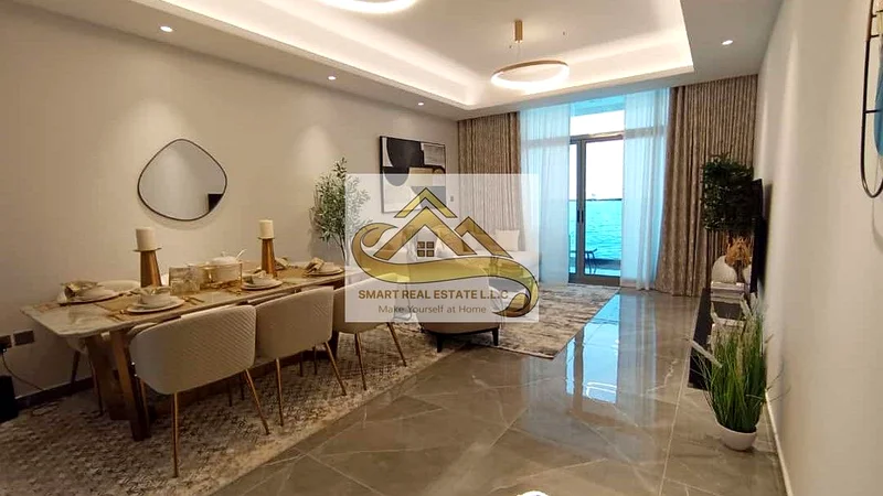 a luxury two  bed room and a hall big size  for sale In the most luxurious towers of Ajman ajman creek towers withe theree  batherooms and a   kitchen63874898573569112
